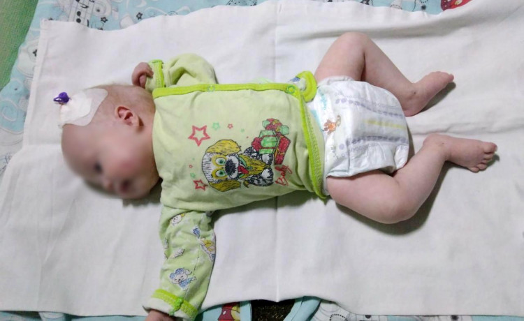 На руках у больничной мамы